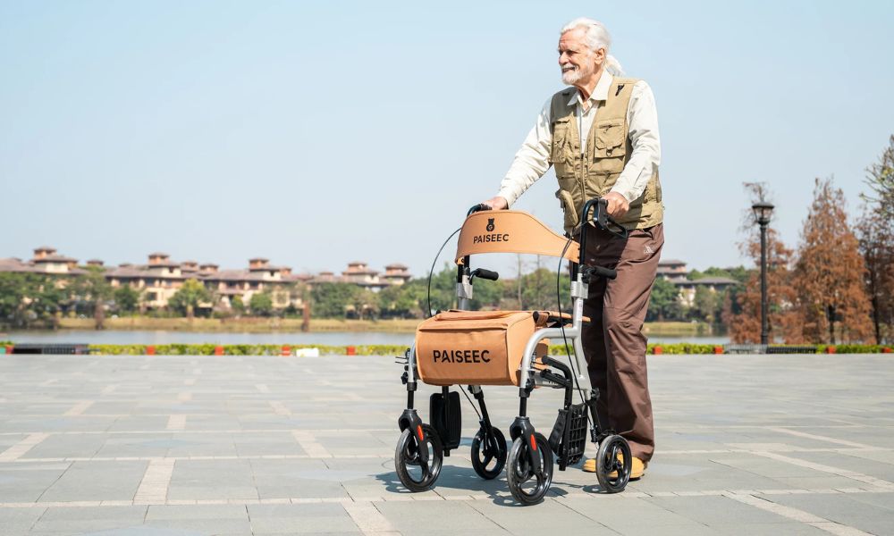 Man uses roller walker to walk by the lake