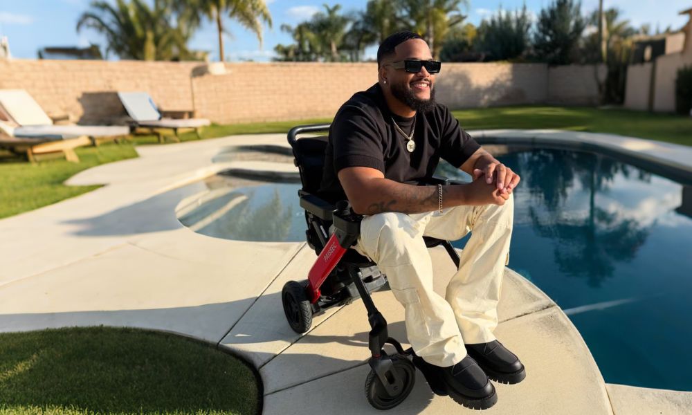 Driving an electric scooter by the pool in the garden