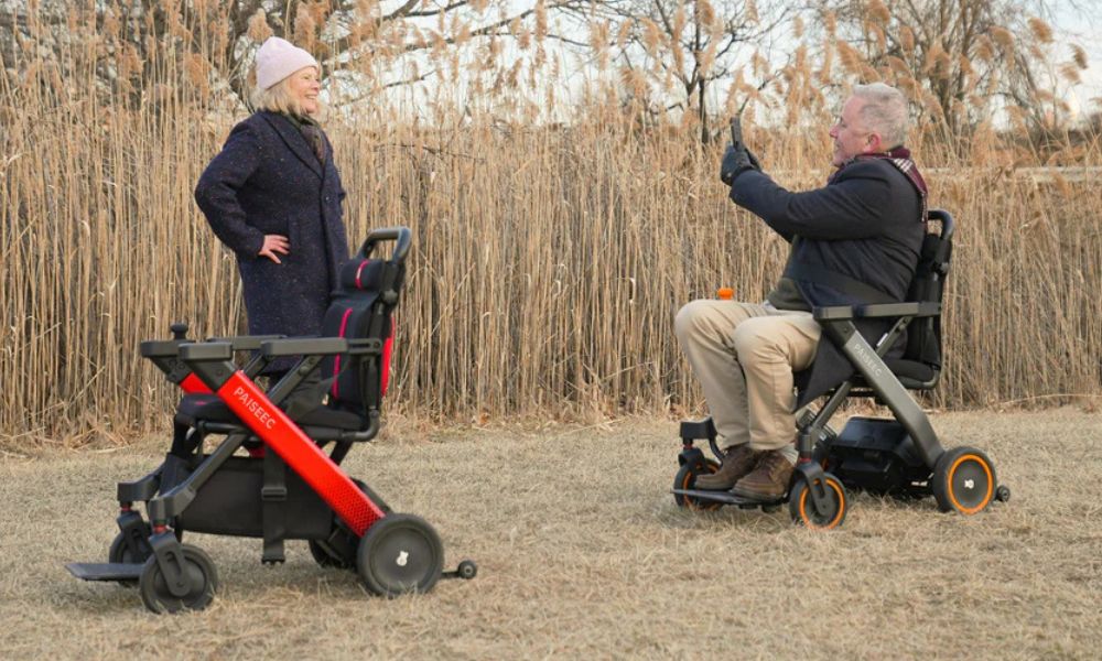 Women and men driving portable wheelchairs